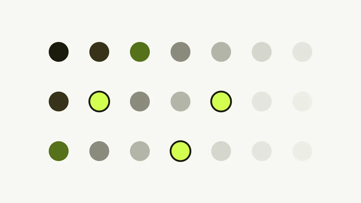 Rows of small circles fading from dark green to pale grey, with three highlighted in lime.